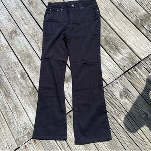 St. John’s Bay secretly slender jeans in jet black. Has trendy ripped belt loop.
